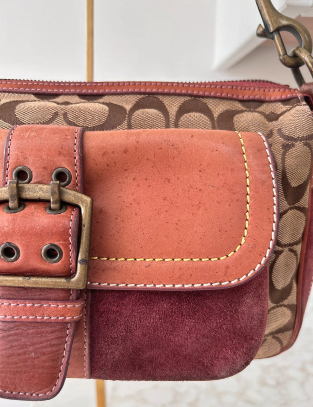 Vintage Coach signature monogram burgundy suede buckle shoulder bag