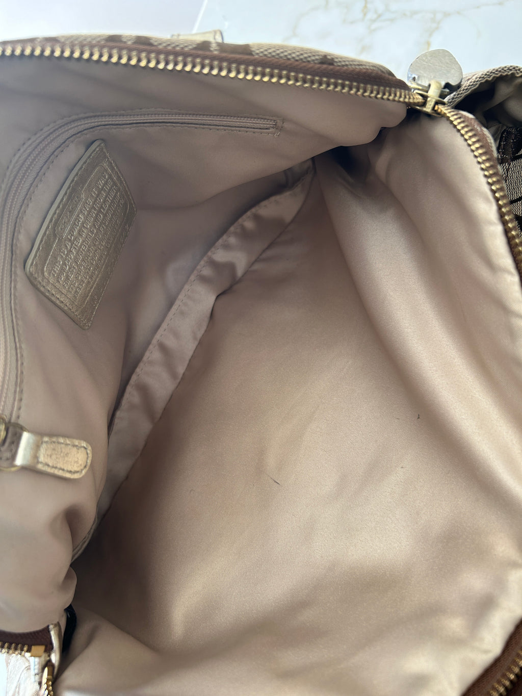 Vintage Coach signature monogram metallic leather shoulder bag