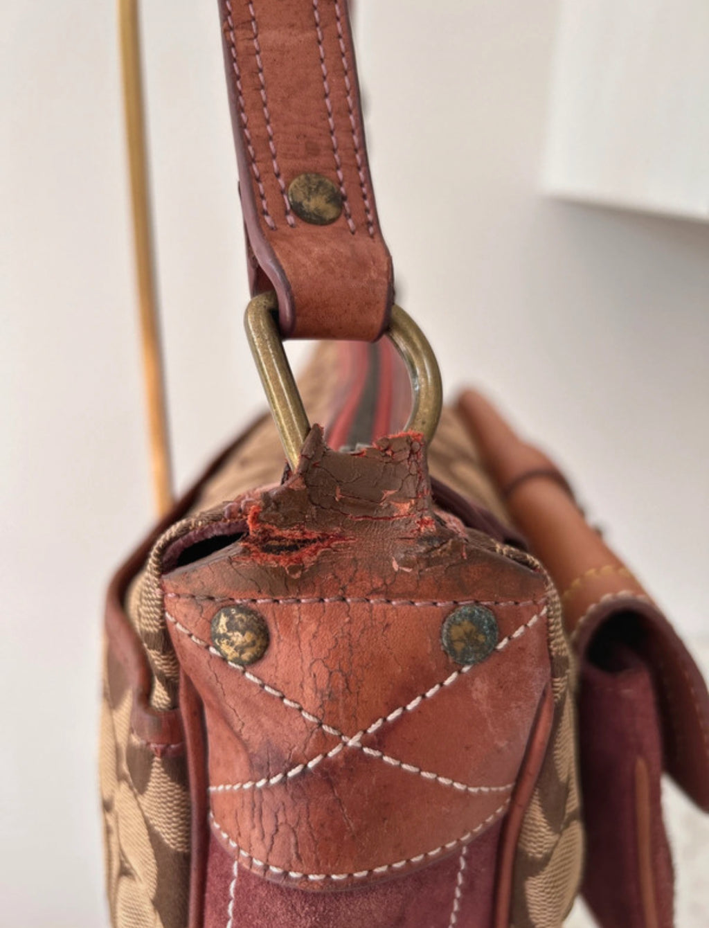 Vintage Coach signature monogram burgundy suede buckle shoulder bag