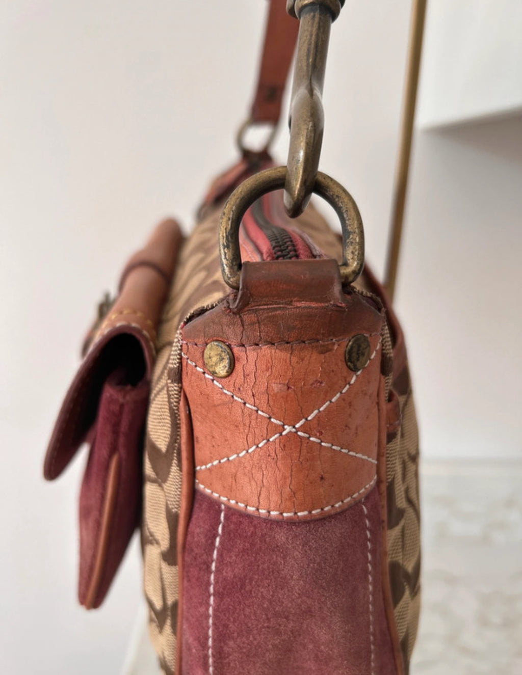 Vintage Coach signature monogram burgundy suede buckle shoulder bag
