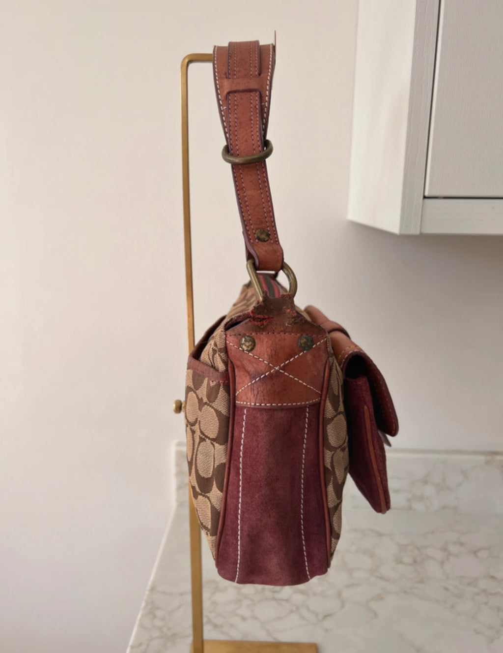 Vintage Coach signature monogram burgundy suede buckle shoulder bag