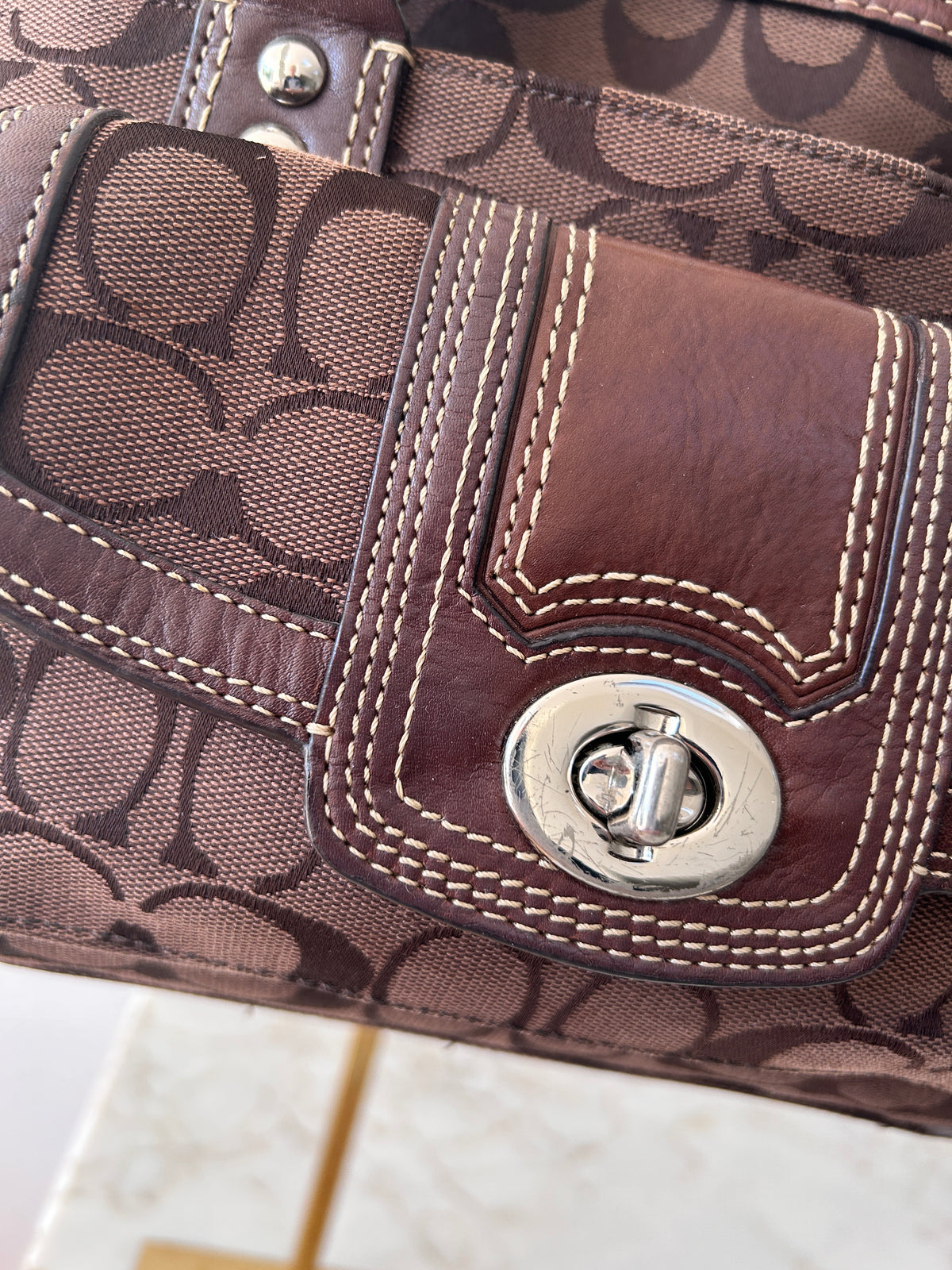 Vintage Coach chocolate brown turnlock shoulder bag