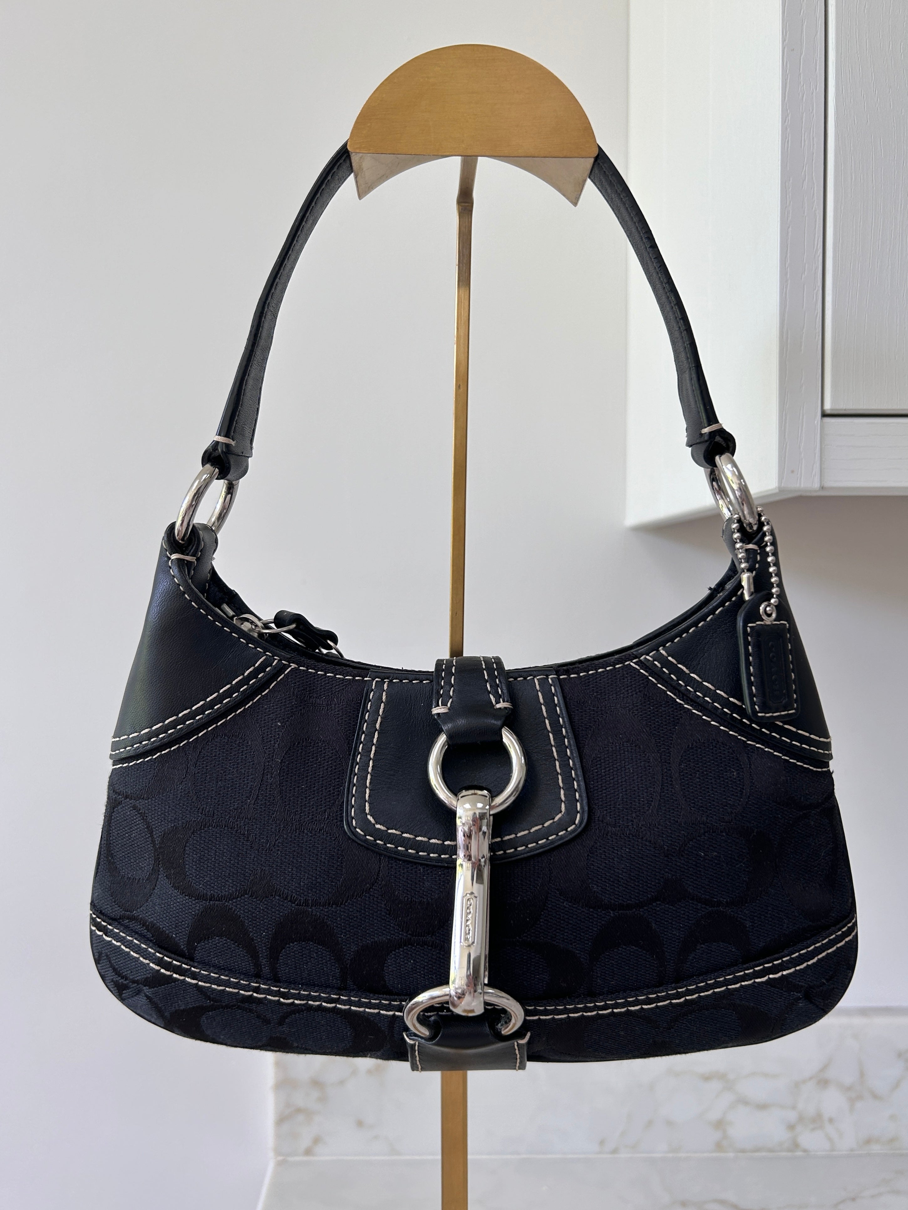 Vintage Coach black monogram clip mini shoulder bag