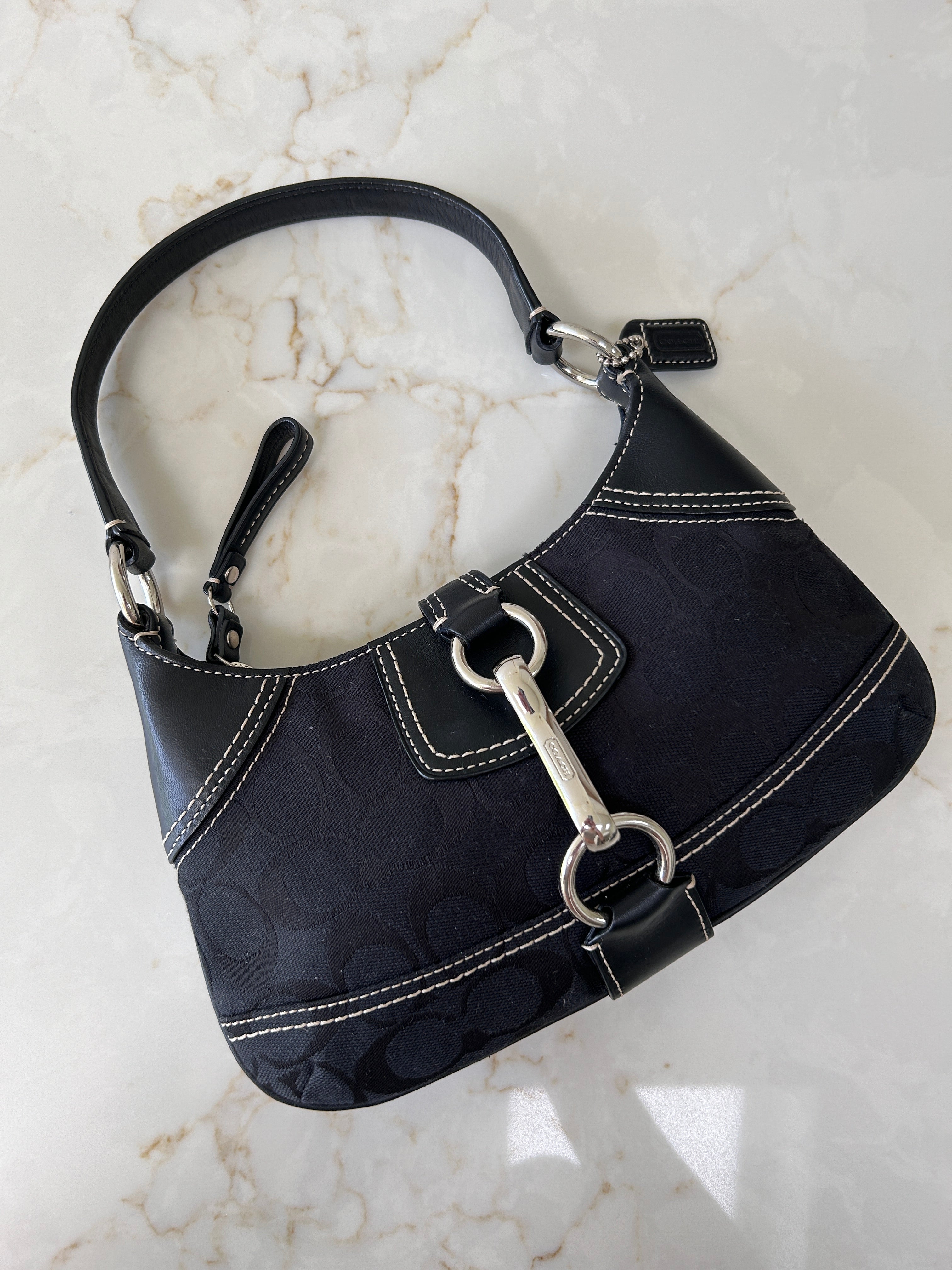 Vintage Coach black monogram clip mini shoulder bag