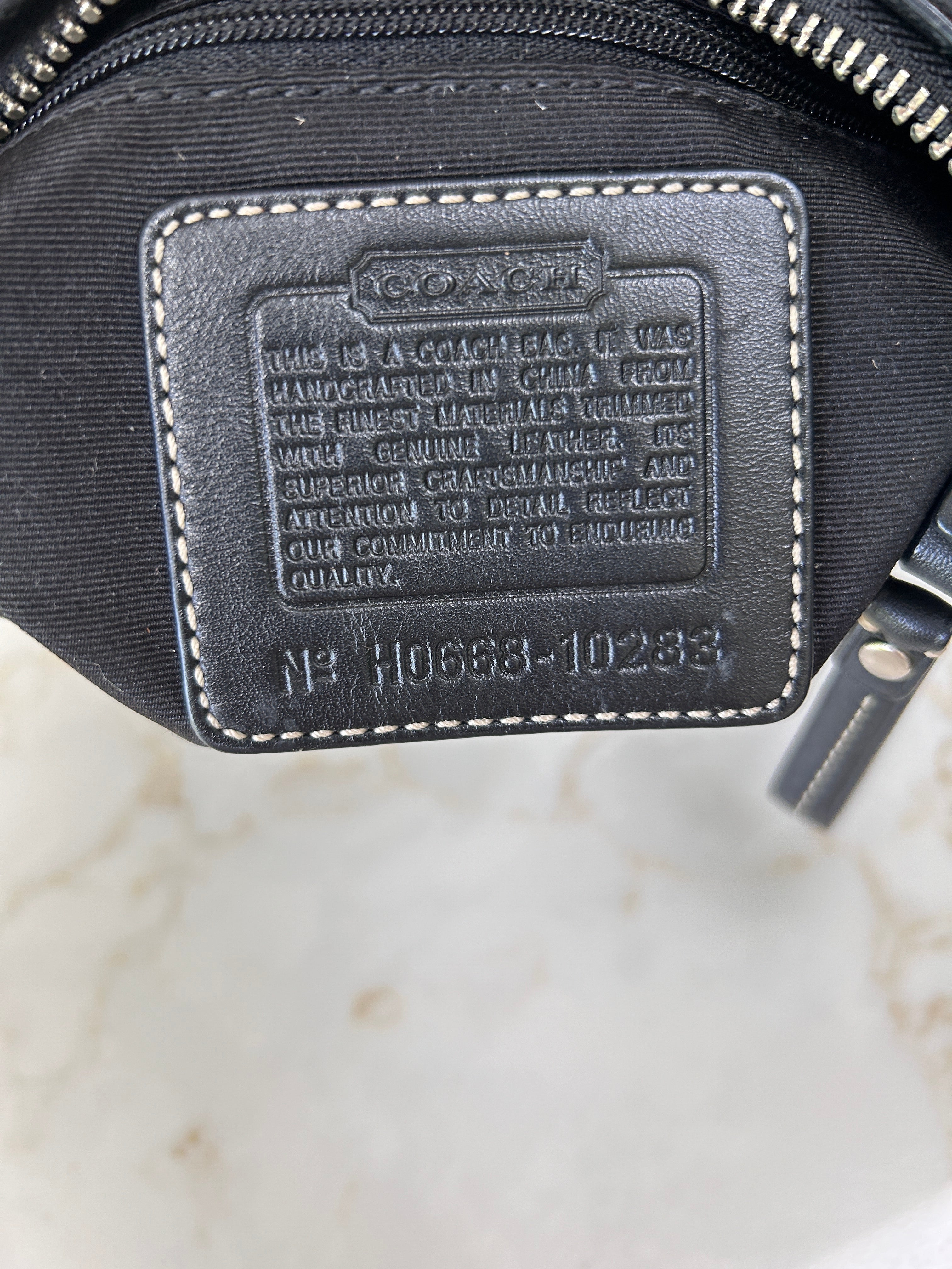 Vintage Coach black monogram clip mini shoulder bag